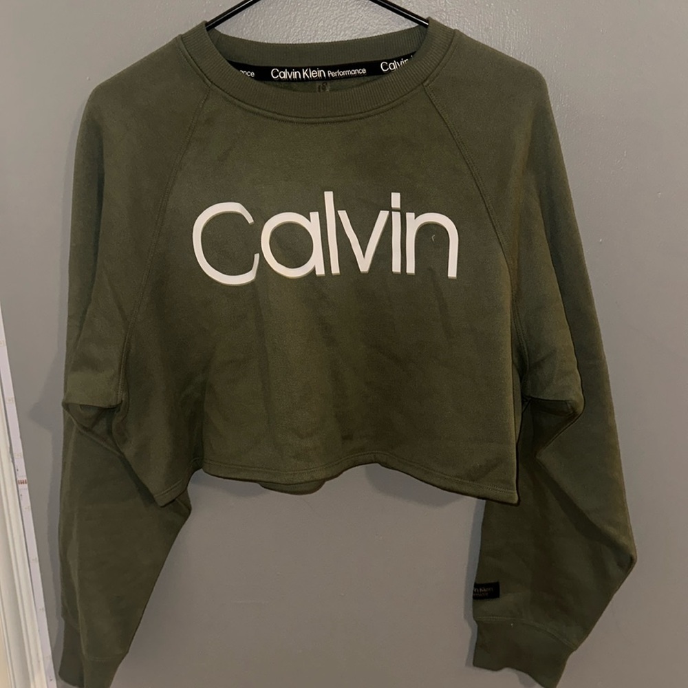 Army green cropped Calvin Klein long sleeve in size large.